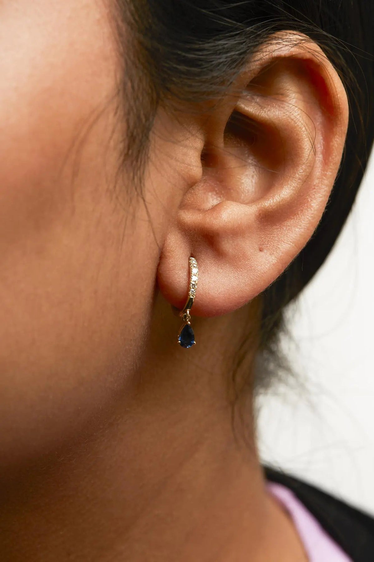 10K Yellow Gold Pear Blue Sapphire and 1/10 Cttw Diamond Drop and Dangle Huggy Hoop Earrings (H - I Color, I1 - I2 Clarity) - Rieworkes